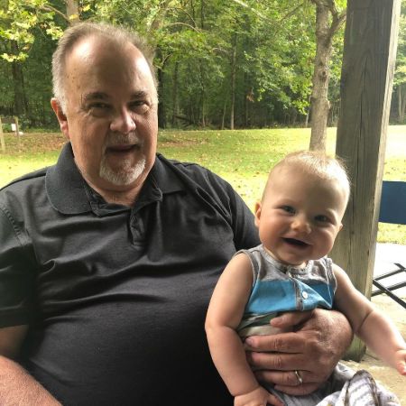 Both are posing for a photo.